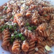 Pasta with wine sauce and peas