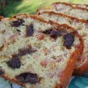 Savoury loaf with lardons, prunes and pine nuts