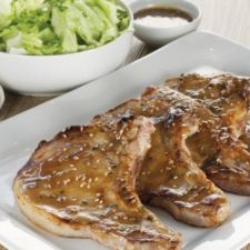 Pork chops marinated in honey mustard and sesame seeds