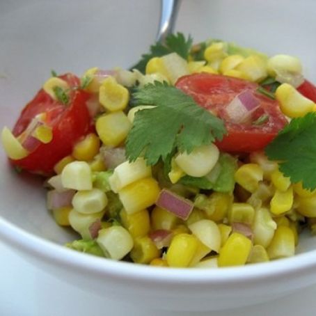 Warm cherry tomato and sweetcorn salad