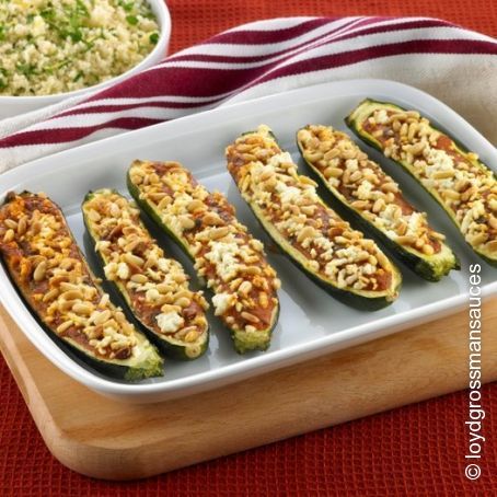 Baked stuffed courgettes with spinach, ricotta and pine nuts