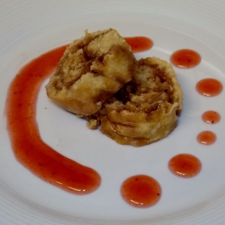 Steamed jam roly poly with jam sauce