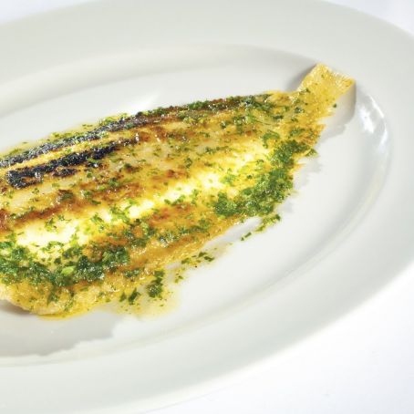 Pan-fried lemon sole with caper and parsley dressing