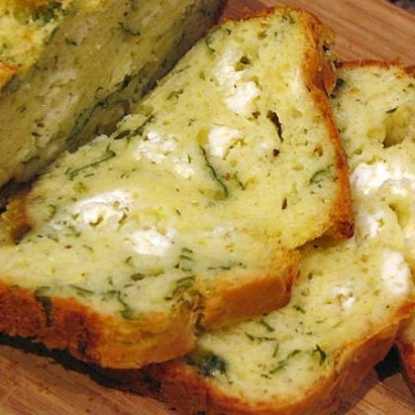Loaf cake with feta cheese and fresh herbs