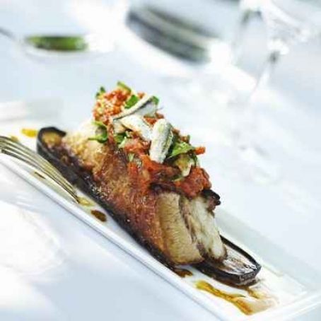 Veal sweetbreads and pickled aubergine, tomato chutney and sweet and sour parsley