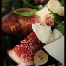 Fancy rocket salad with figs and parmesan shavings