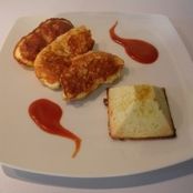 Pyramid of cauliflower and a heart of cherry tomatoes with filet mignon of turkey and Parmesan