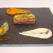 Slate of grilled lamb with rosemary, hazelnut and orange zest crumble,  mashed pumpkin and artichokes