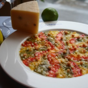 Carpaccio of sweet peppers in white balsamic vinegar, basil and pecorino.