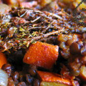 Pumpkin, tomato, onion and green lentil stew