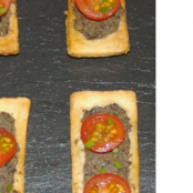 Tartlets with tapenade and cherry tomatoes