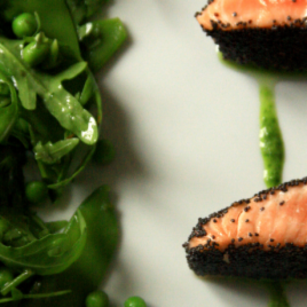 Poppy seed-crusted salmon with a green pea salad flavoured with Wasabi