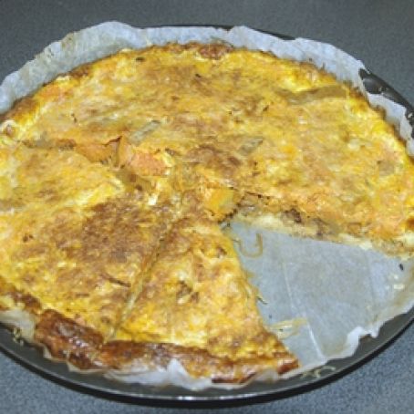 Sucrine lettuce quiche on a bed of onions